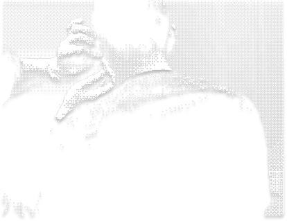 Close-up of a person touching the back of their neck with one hand, head turned away from the camera.