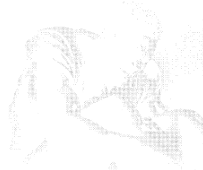 Black and white image of an injured football player sitting on the ground, holding his knee in pain.