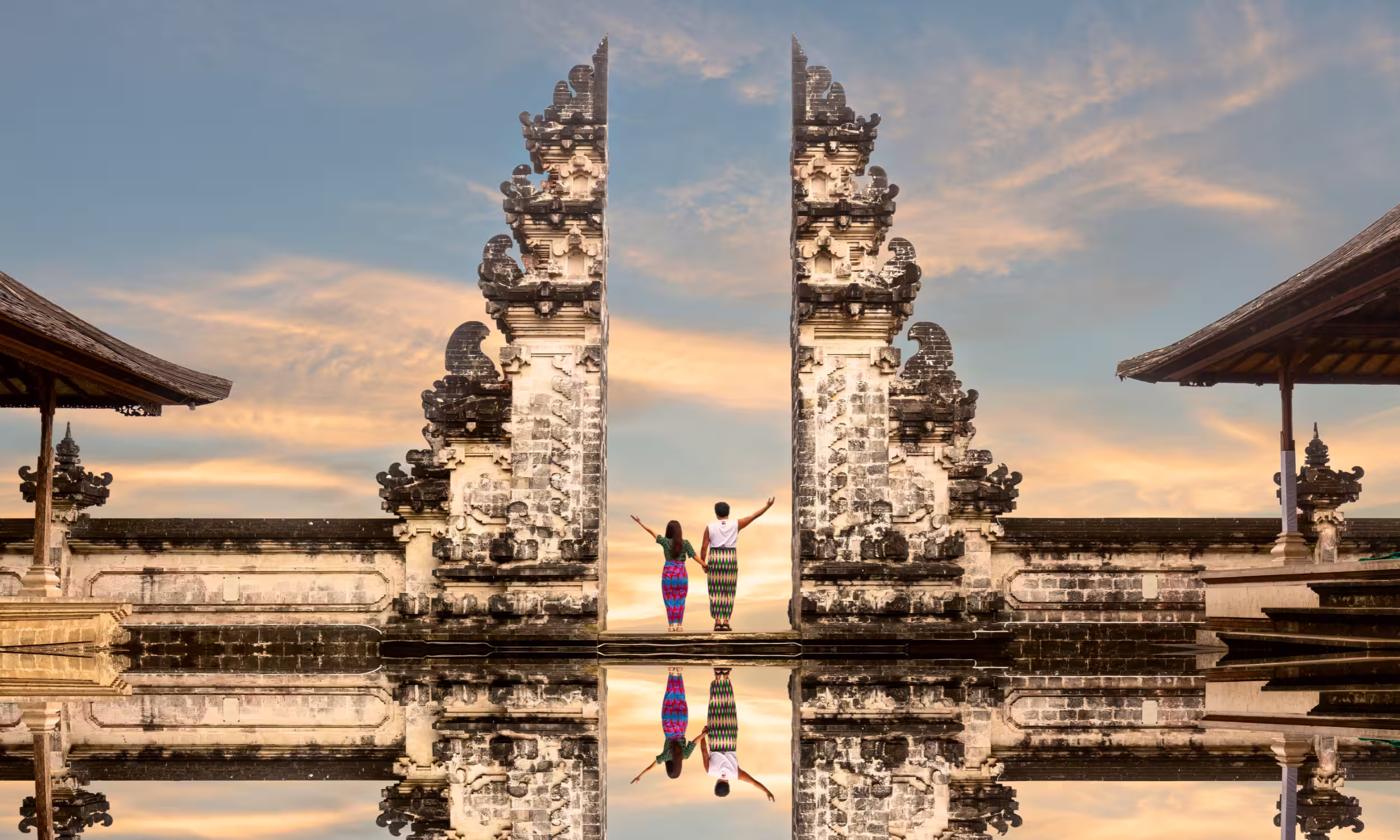 Couple standing at Pura Lempuyang, Bali’s famous Gates of Heaven temple. 