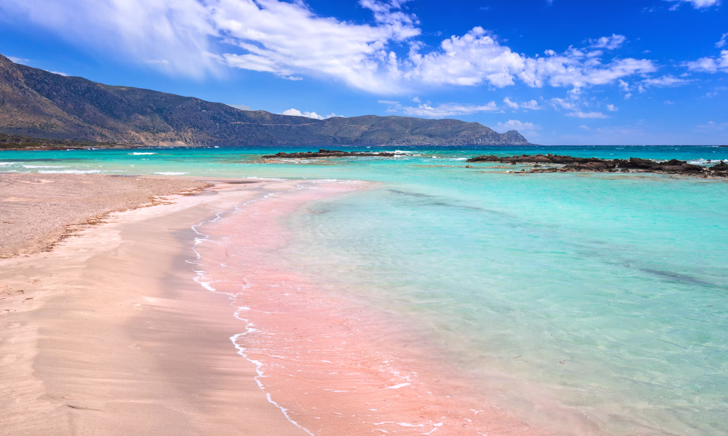 Elafonissi Beach with pink sand and crystal-clear waters in Crete. 