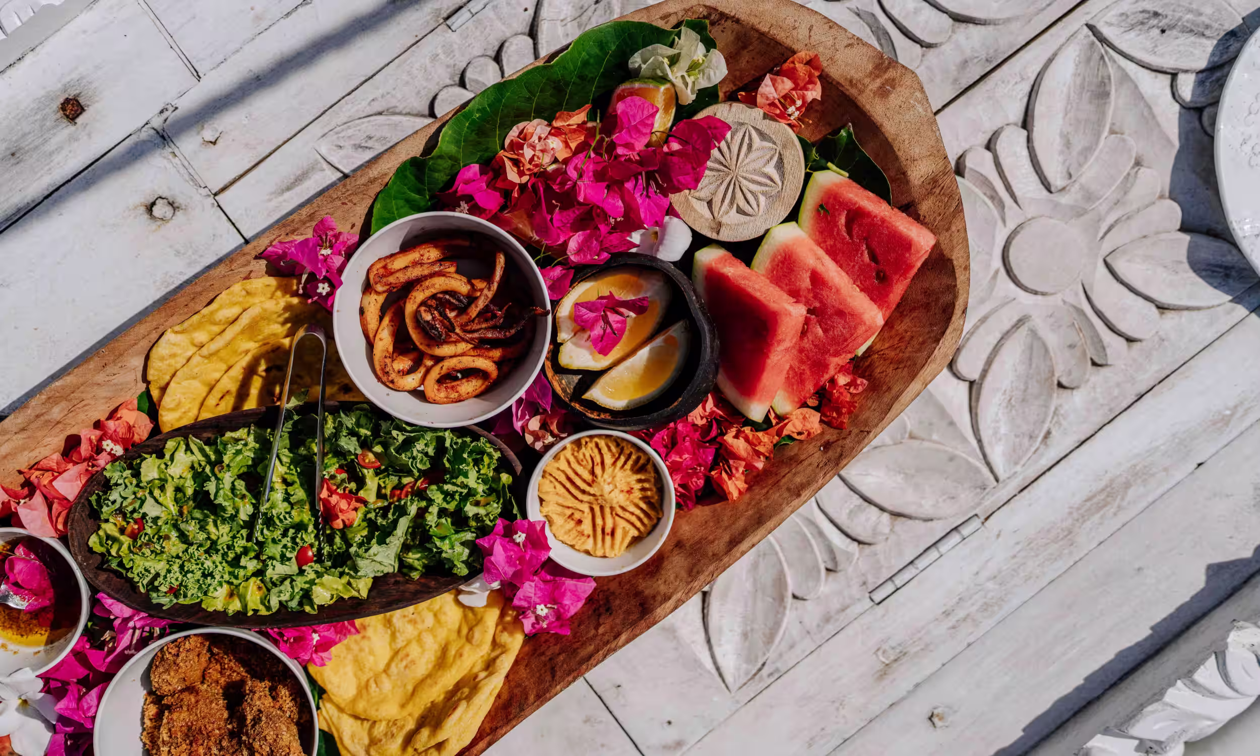 Colourful platter of Zanzibar’s traditional Swahili cuisine with tropical fruits. 