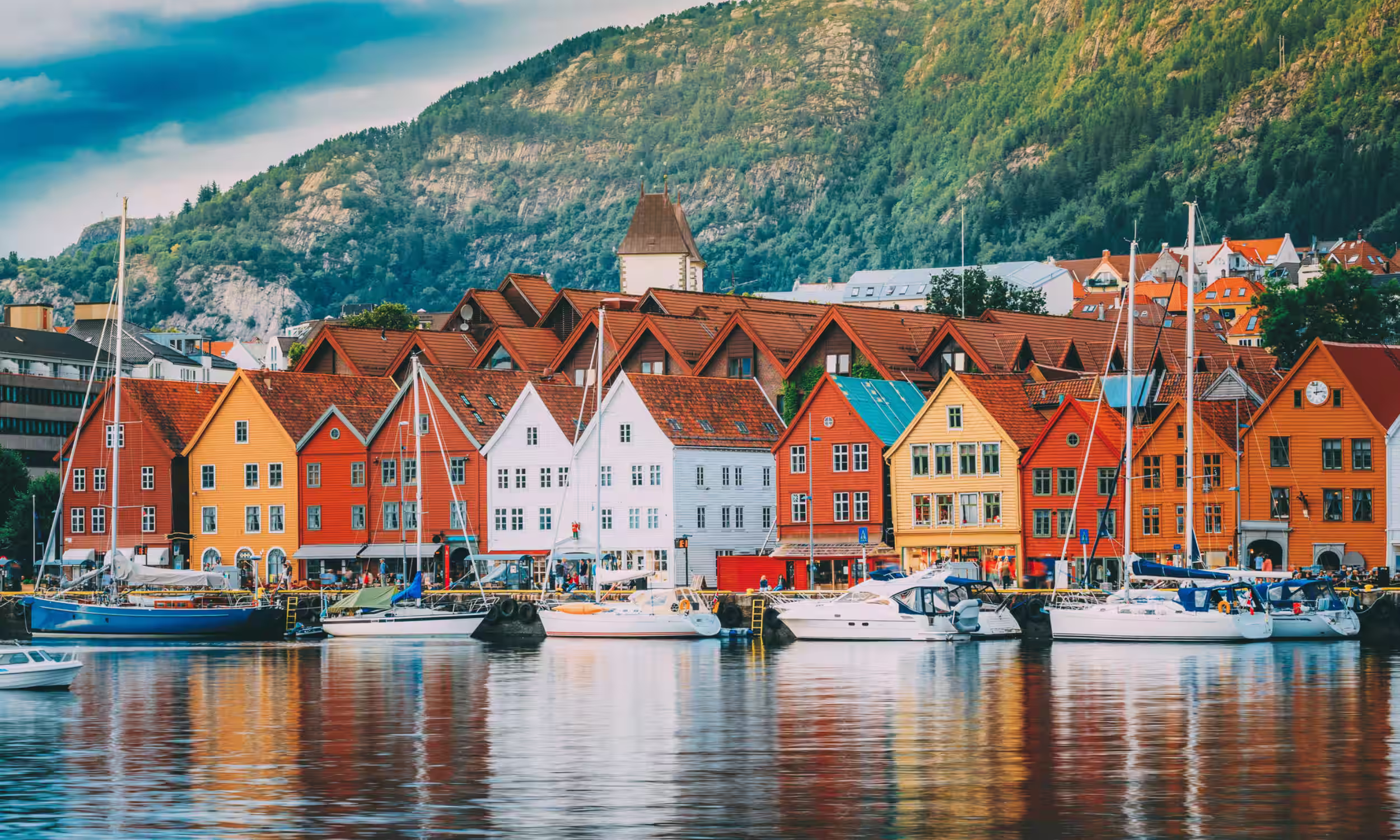 Colorful Bryggen harbor houses in Bergen, a romantic city for a Norway honeymoon 