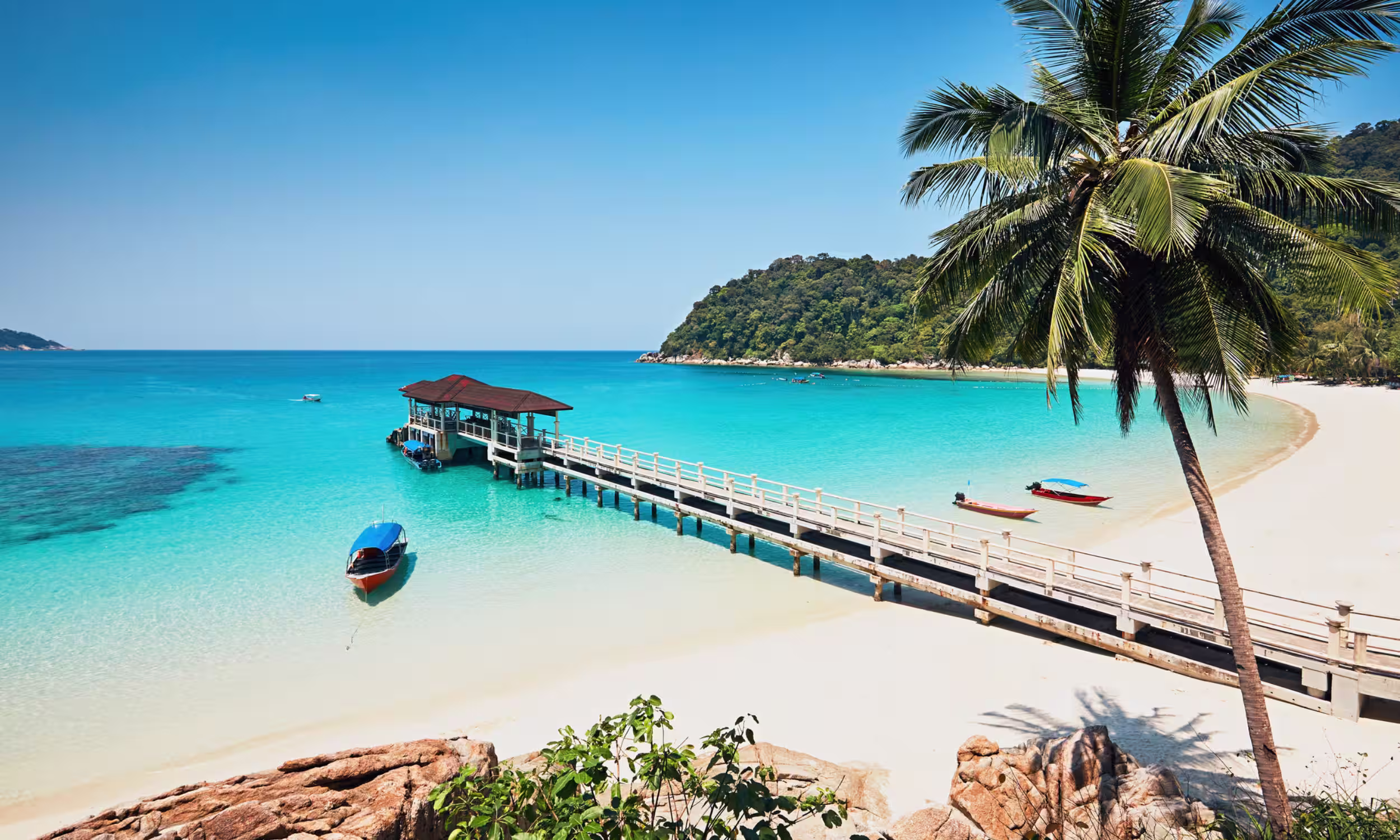 Perhentian Islands with crystal-clear water, a romantic beach honeymoon destination 