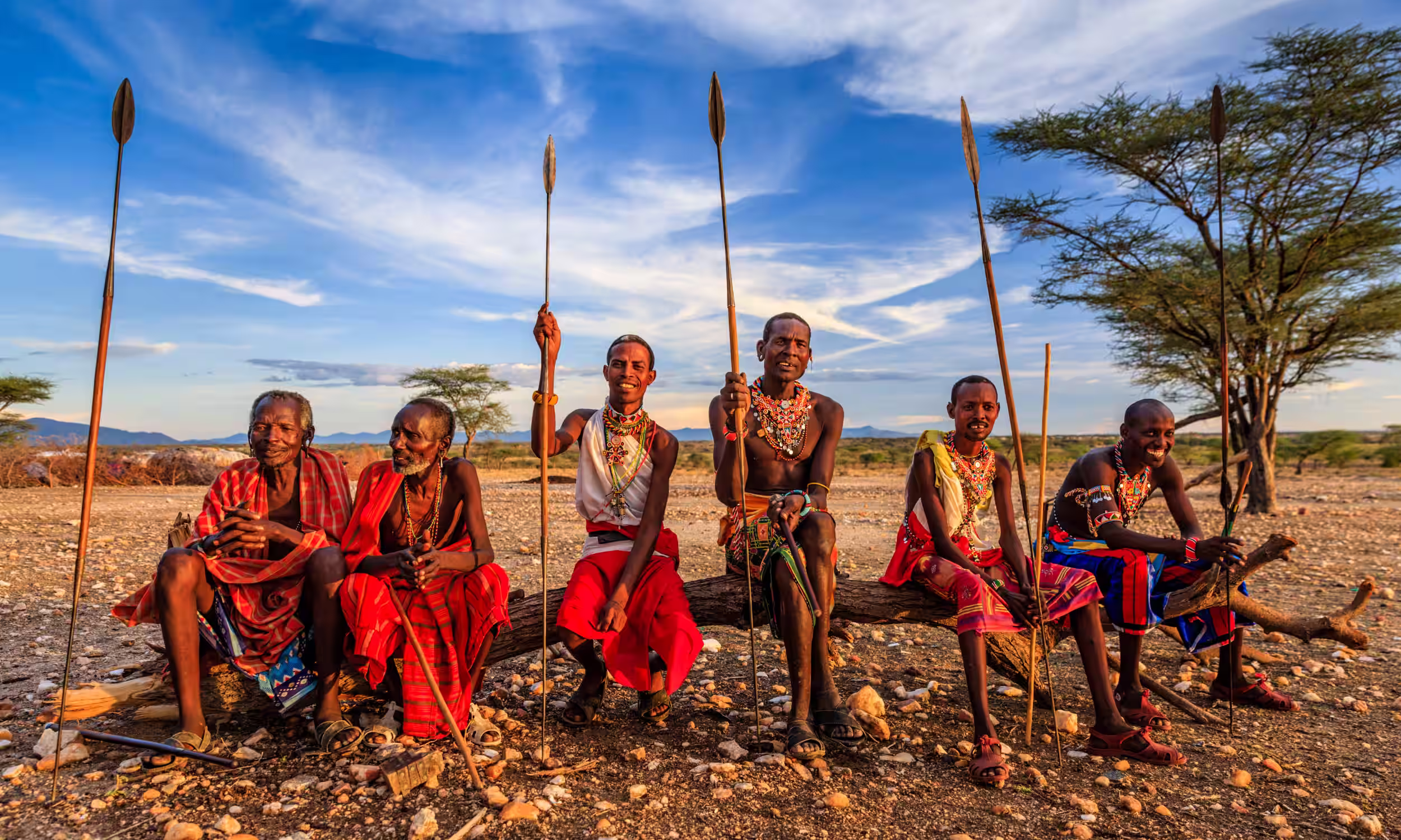 Maasai warriors in traditional ceremony, a cultural honeymoon experience in Kenya