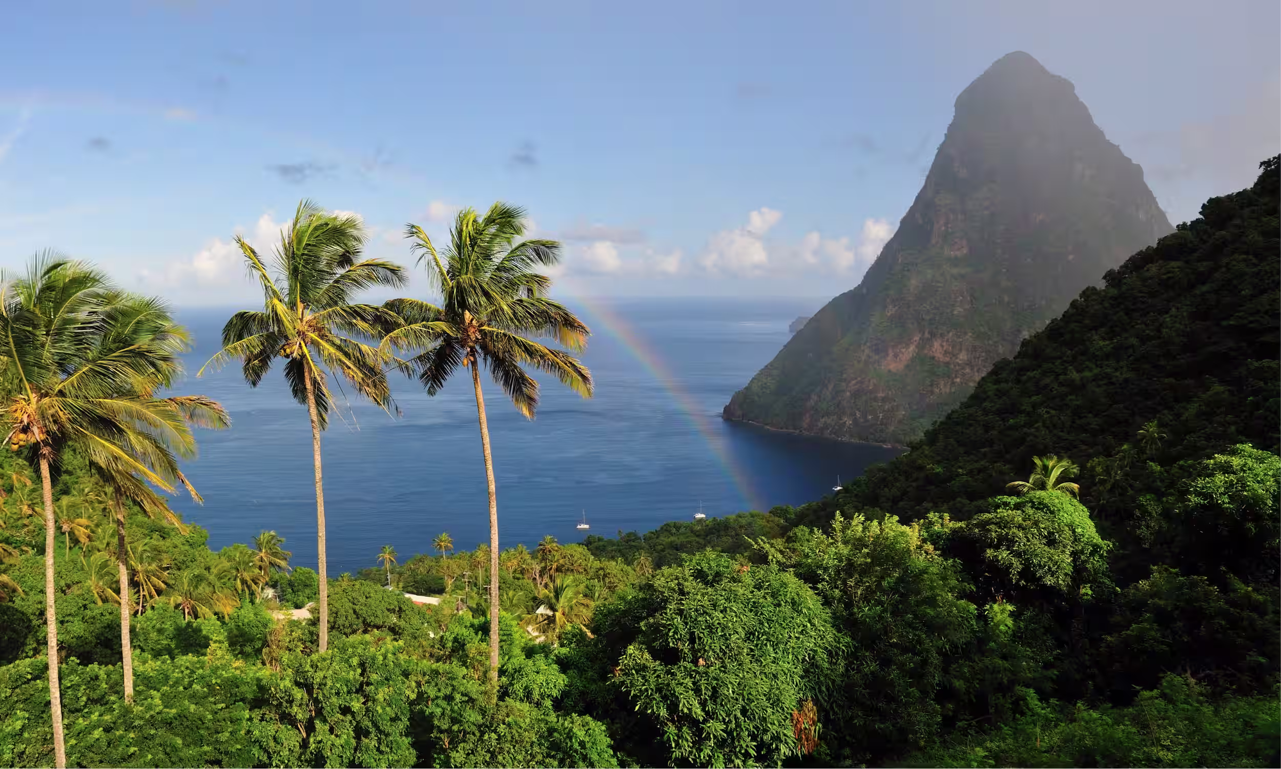 View of the Pitons in Saint Lucia with ocean and tropical landscape