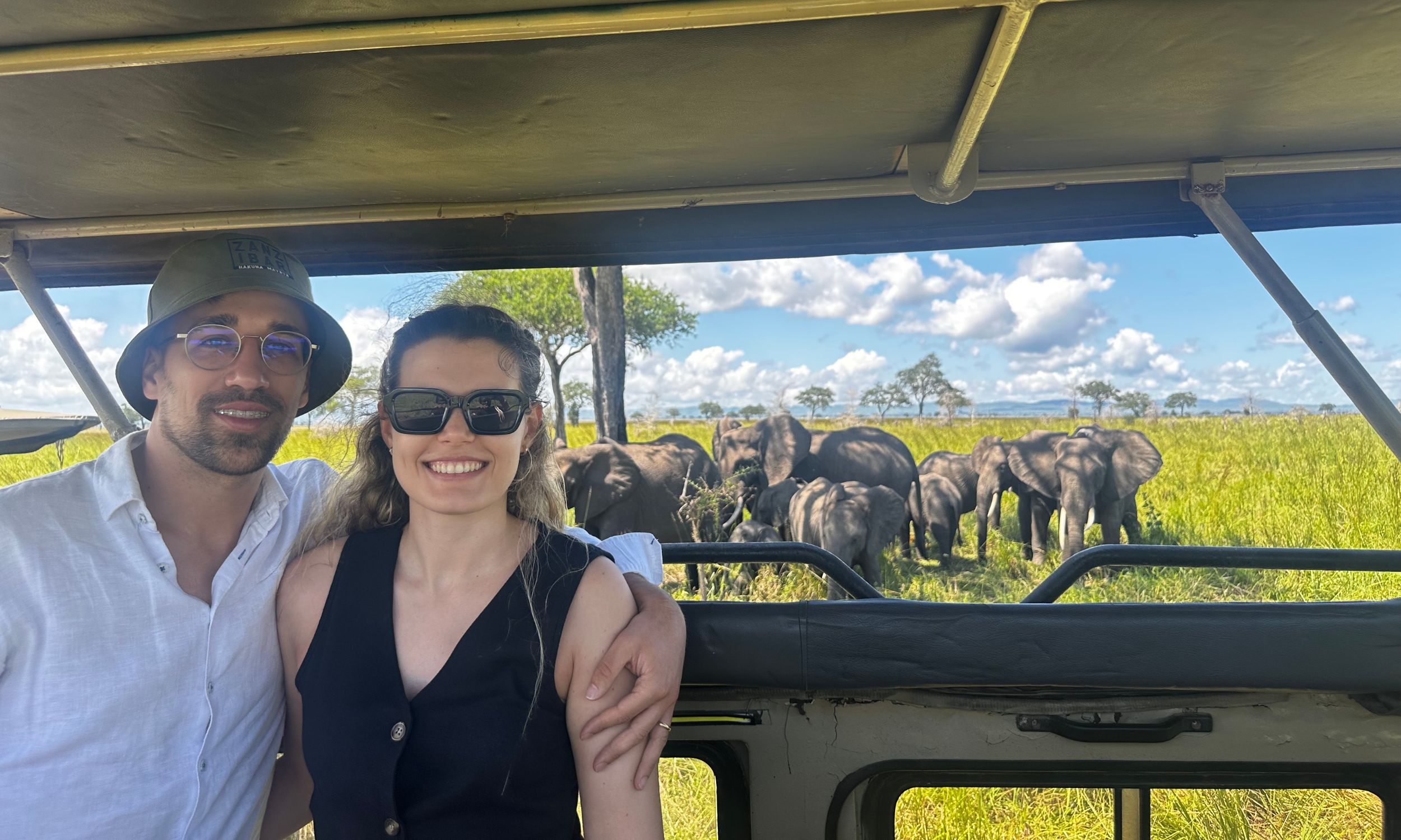 Honeymooners couple on safari in Zanzibar during their customized honeymoon designed by Honeymooners.