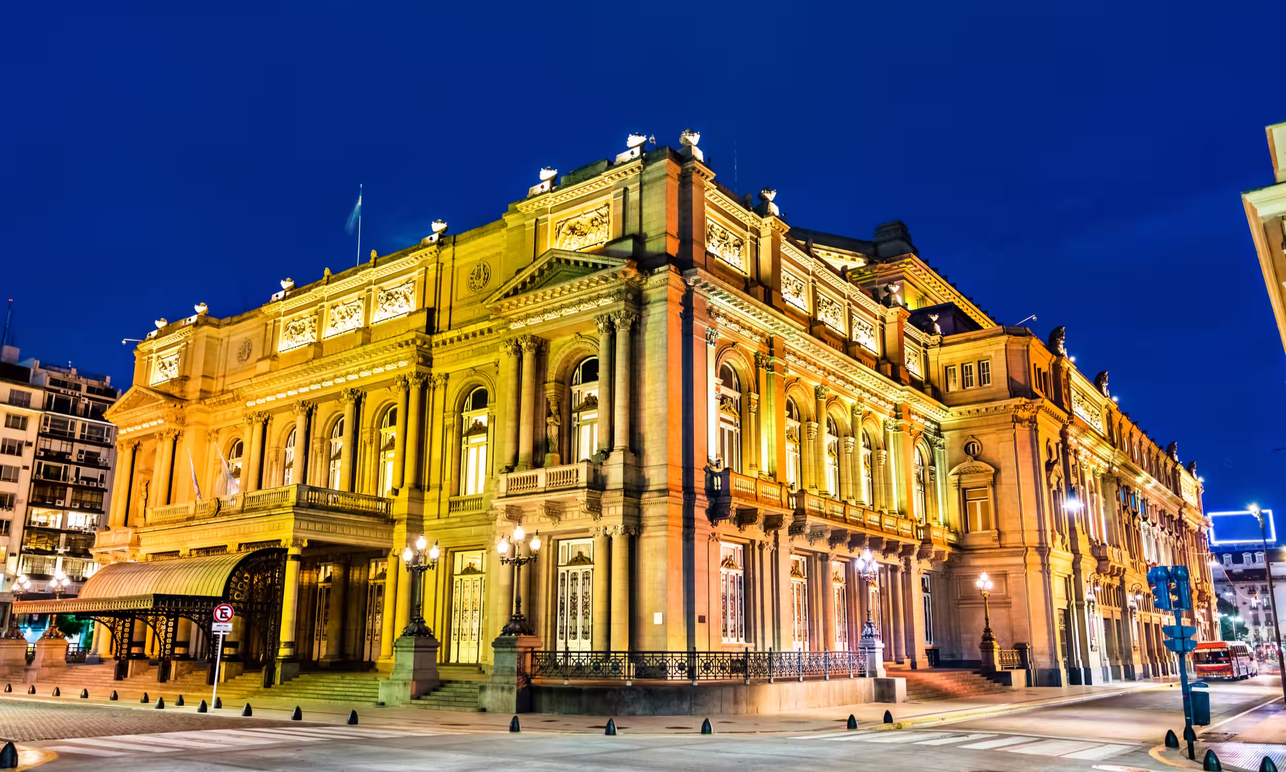 Teatro Colón illuminated at night in Buenos Aires, one of the world’s most iconic opera houses.