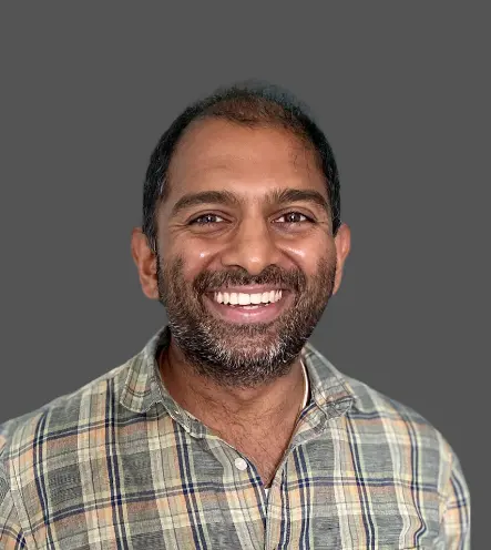 a headshot of Raghu Nandakumara