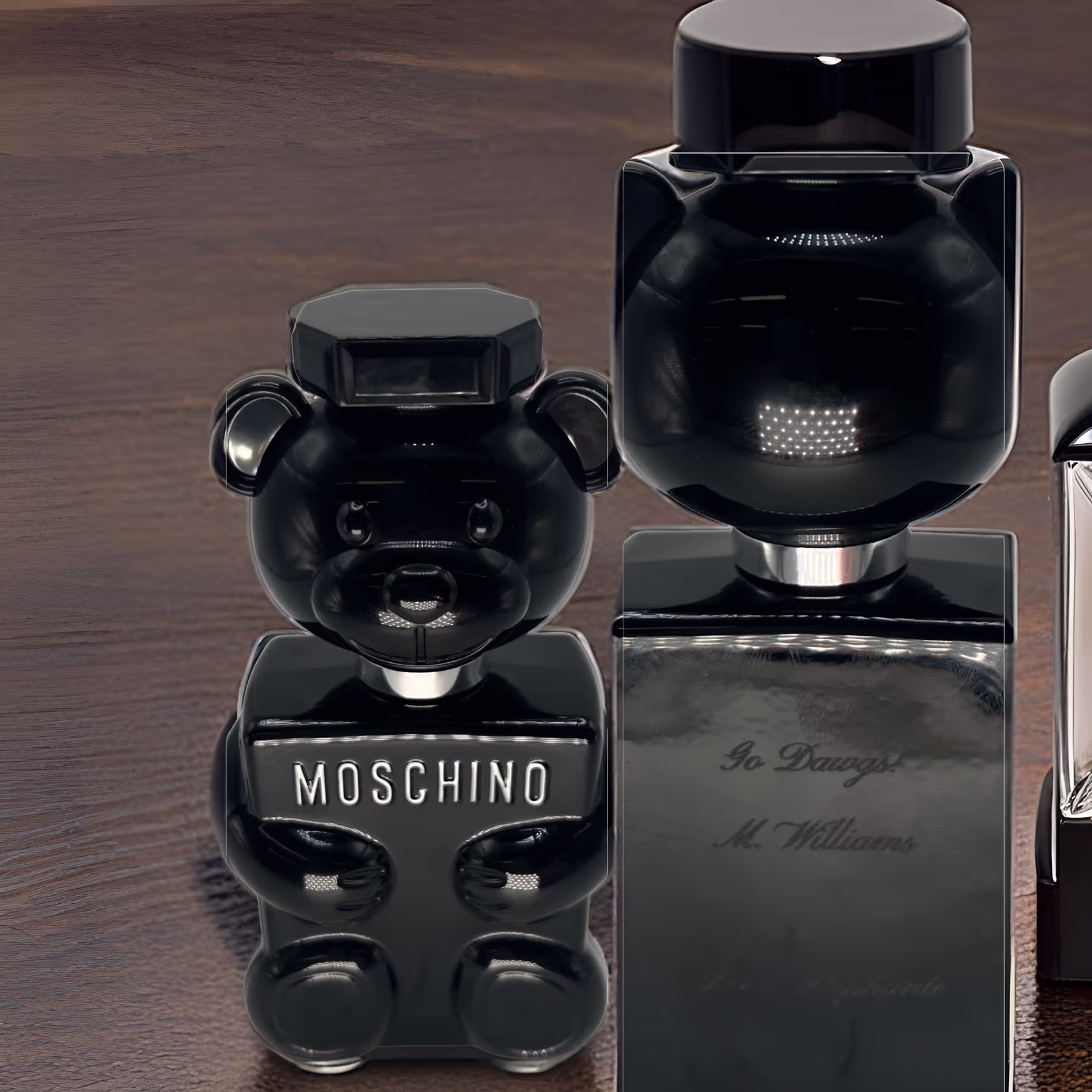 Laser-engraved Moschino perfume bottle with a message in Miami and Fort Lauderdale.