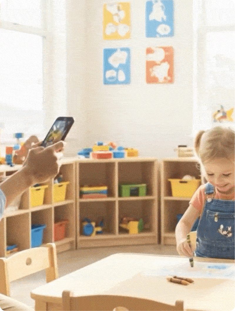 Snap a few photos - teacher taking photo