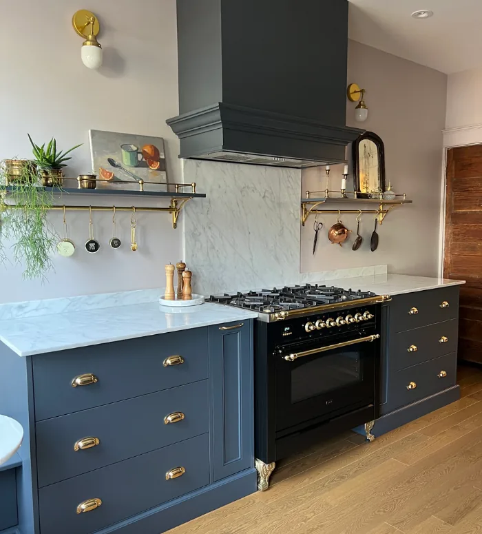 Navy custom kitchen cabinets with open wood shelving