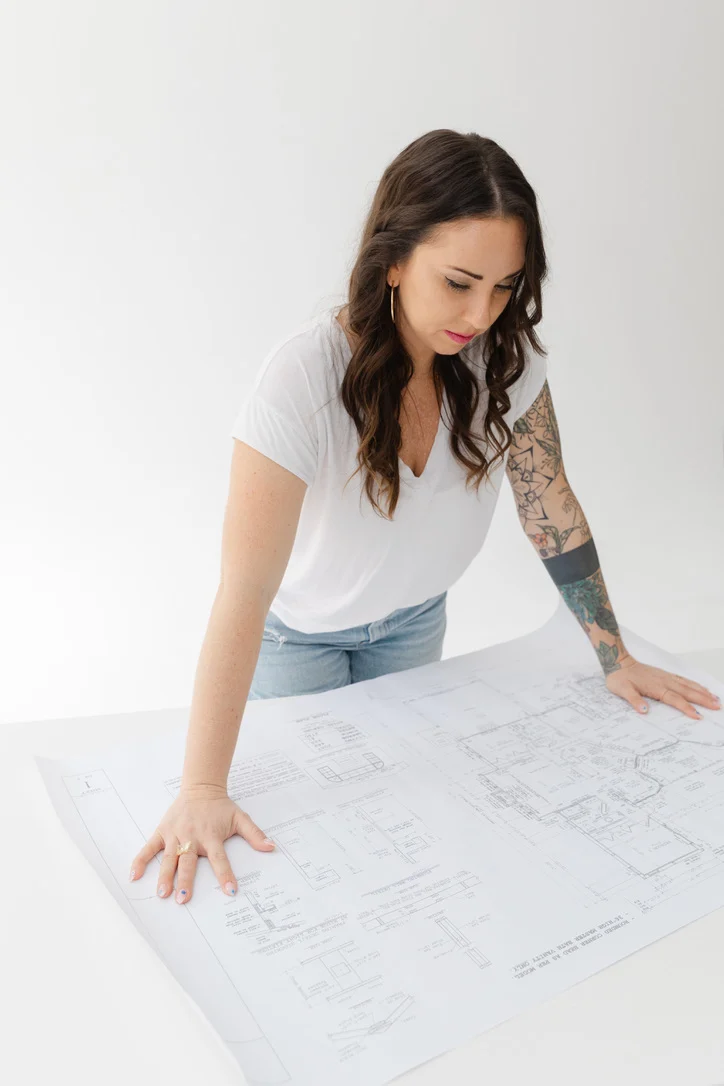 Woman looking at a startup plan