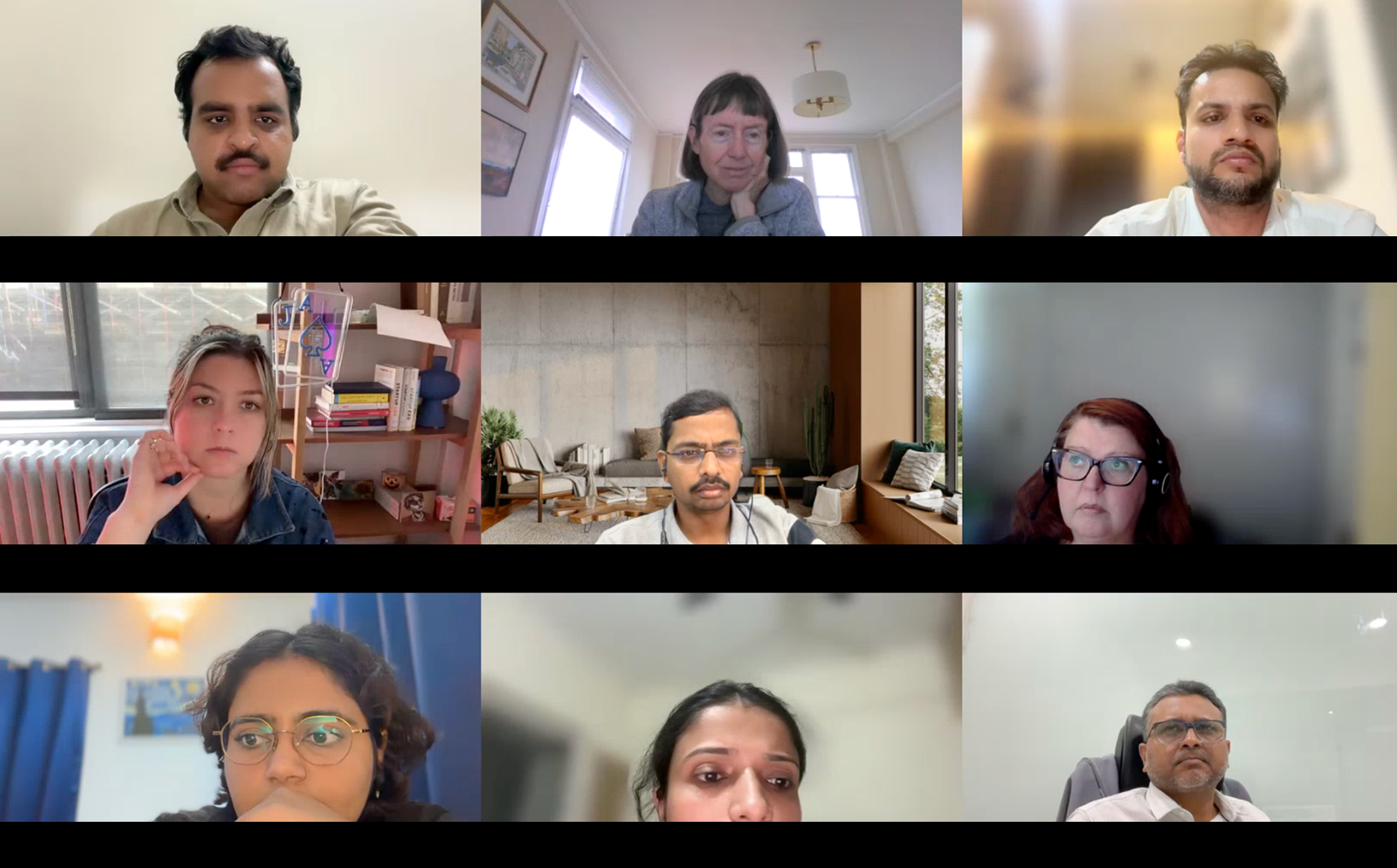 Screenshot of a virtual meeting with twelve participants discussing strategy and collaboration for Interactive Reports.