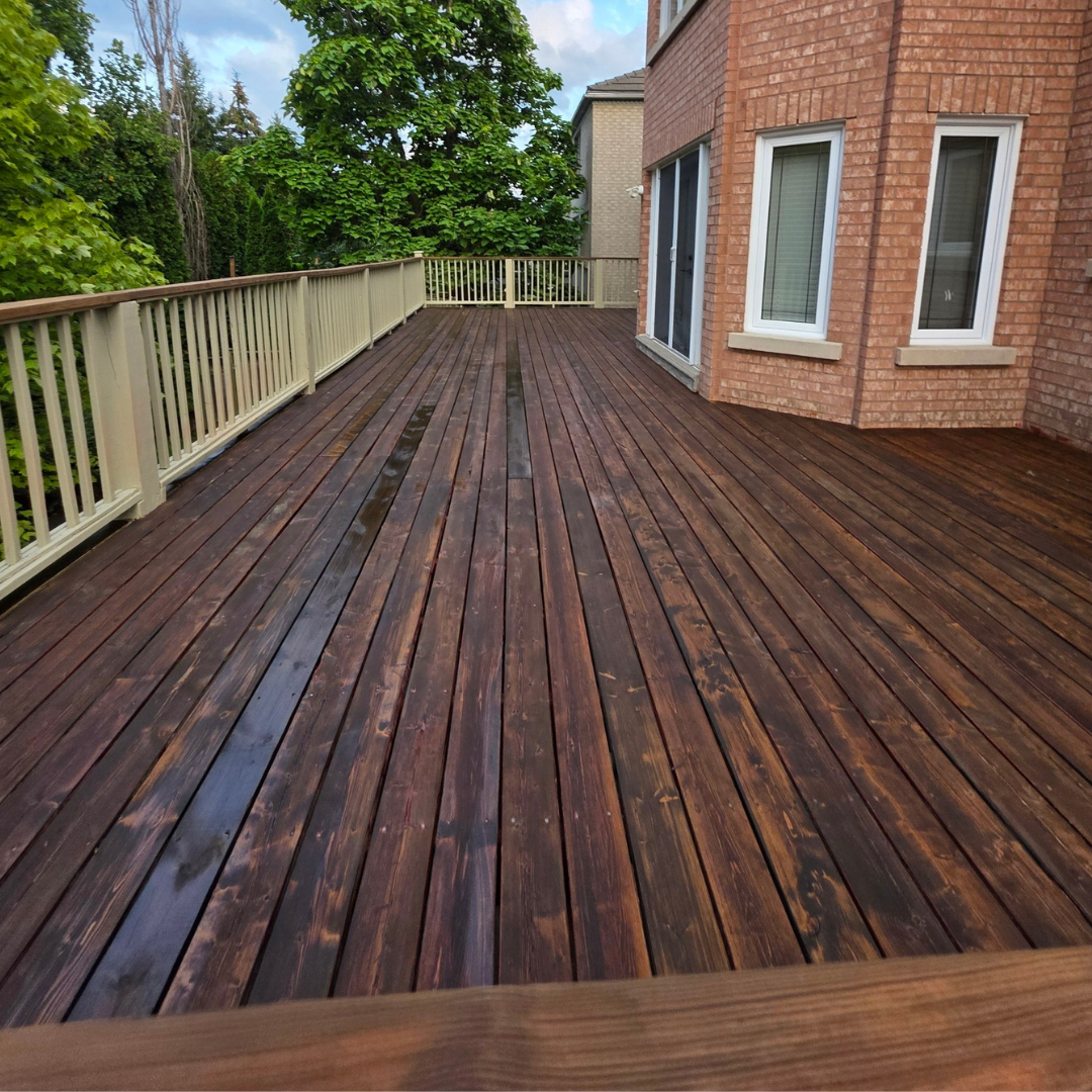 deck stained with semi-transparent stain which comes with non-peeling warranty