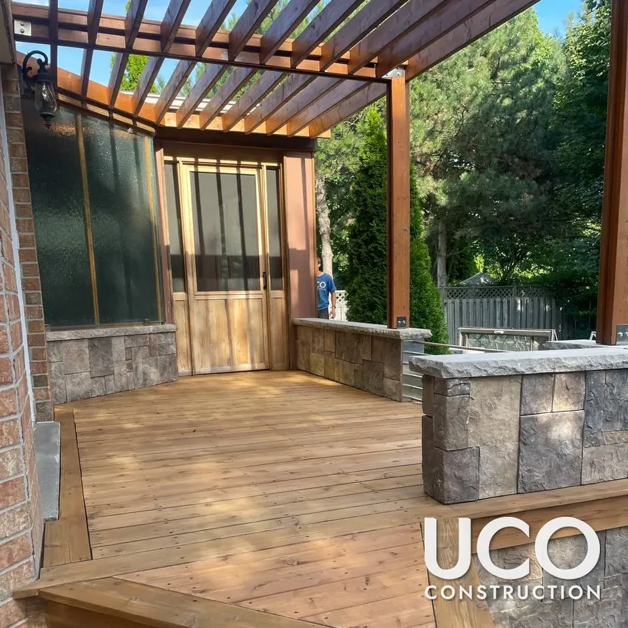 Whitby cedar deck and sunroom floor restored with replaced boards and a natural cedar stain