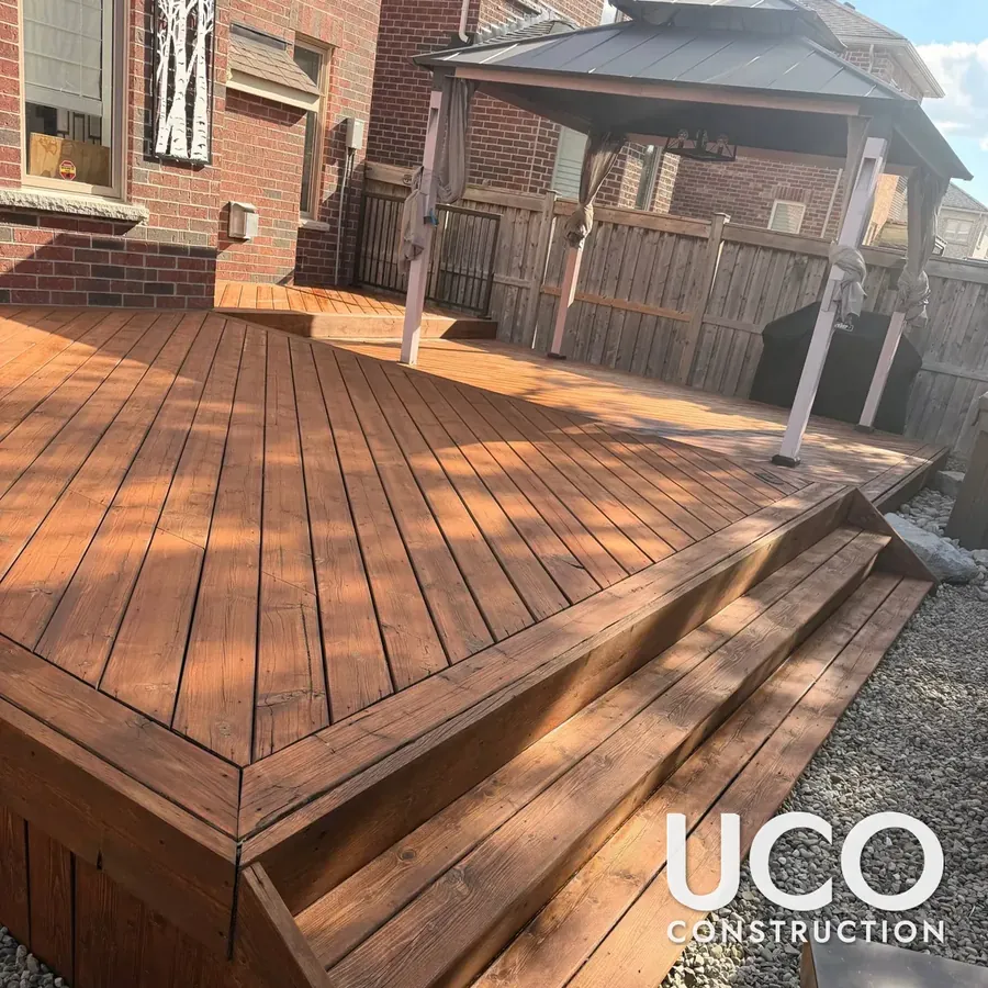 Georgetown deck with diagonal boards and wide steps sanded and oil-stained