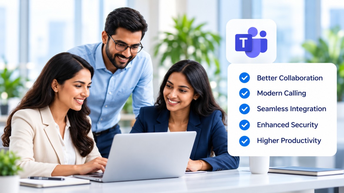 Colleagues collaborating together on a laptop in a modern office