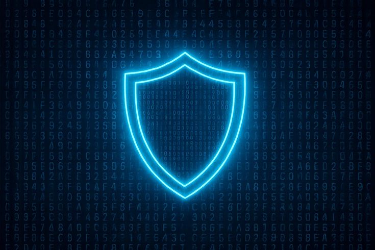 Employee working securely on a laptop protected by an endpoint security shield