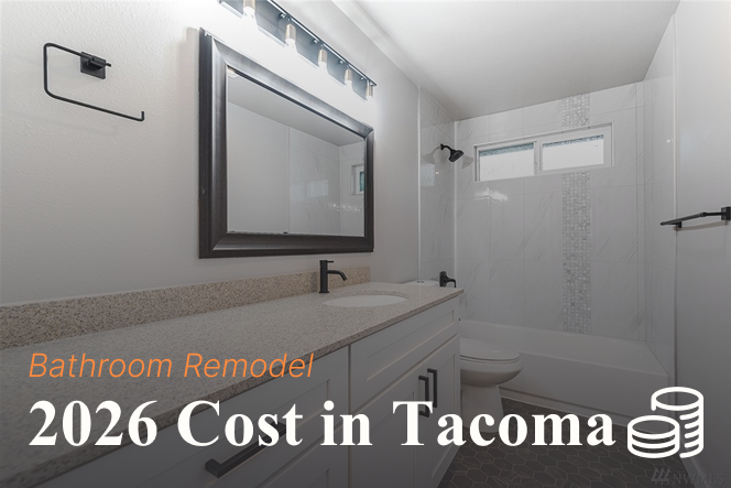 Modern remodeled bathroom with white vanity, framed mirror, and tiled shower, with text overlay: "Bathroom Remodel 2026 Cost in Tacoma".