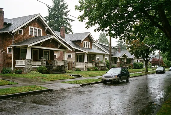 A residential street in Tacoma's North End lined with older Craftsman homes.