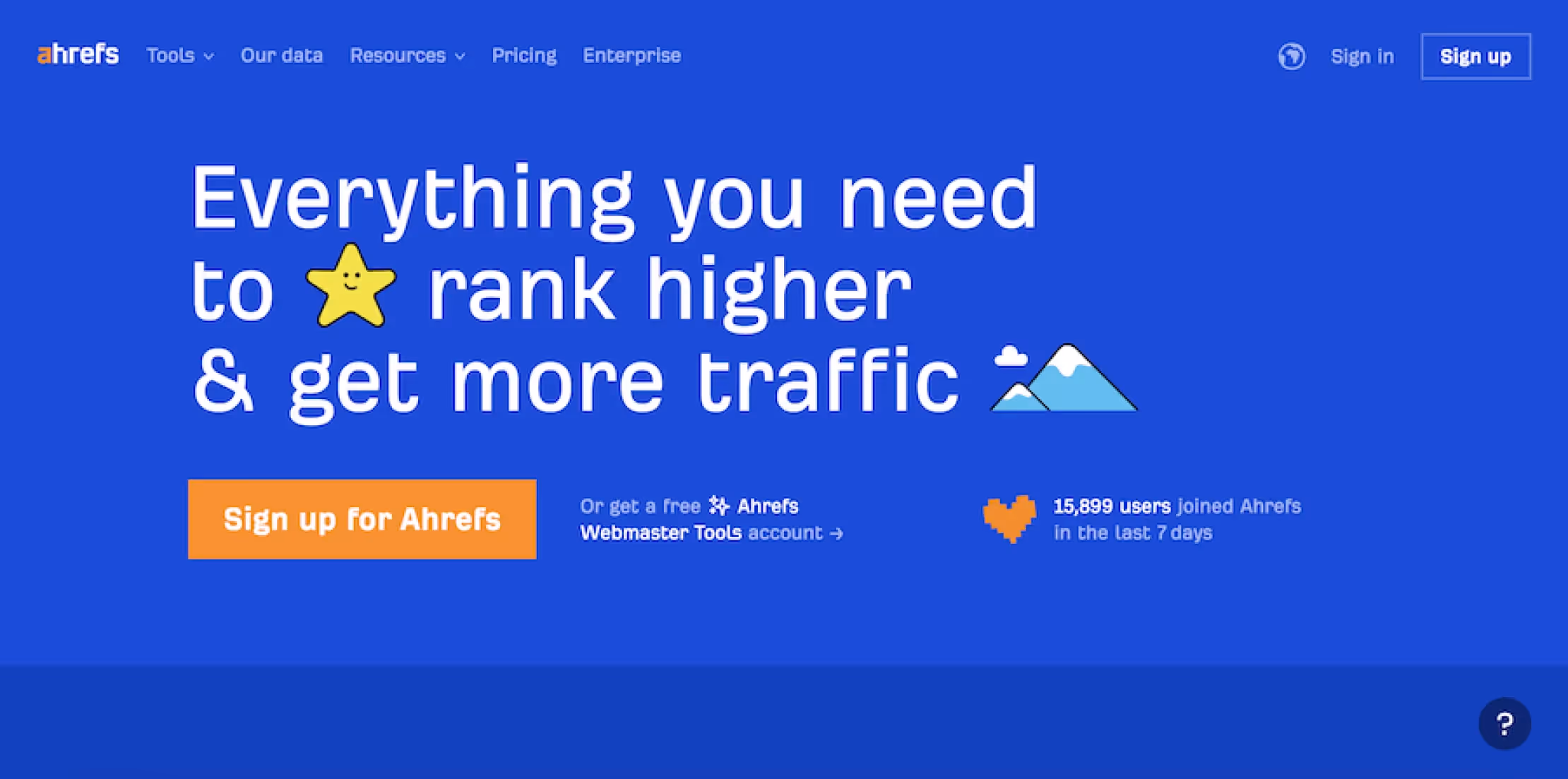Ahrefs homepage with the headline 'Everything you need to rank higher & get more traffic' and a call-to-action button to sign up.