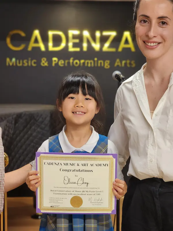 Young piano student achieves an excellent result on her Royal Conservatory of Music (RCM) piano examination.