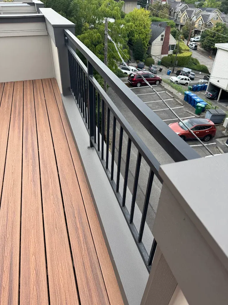 Waterproof deck coating applied to a Bellevue home deck with sealed surface and protected framing