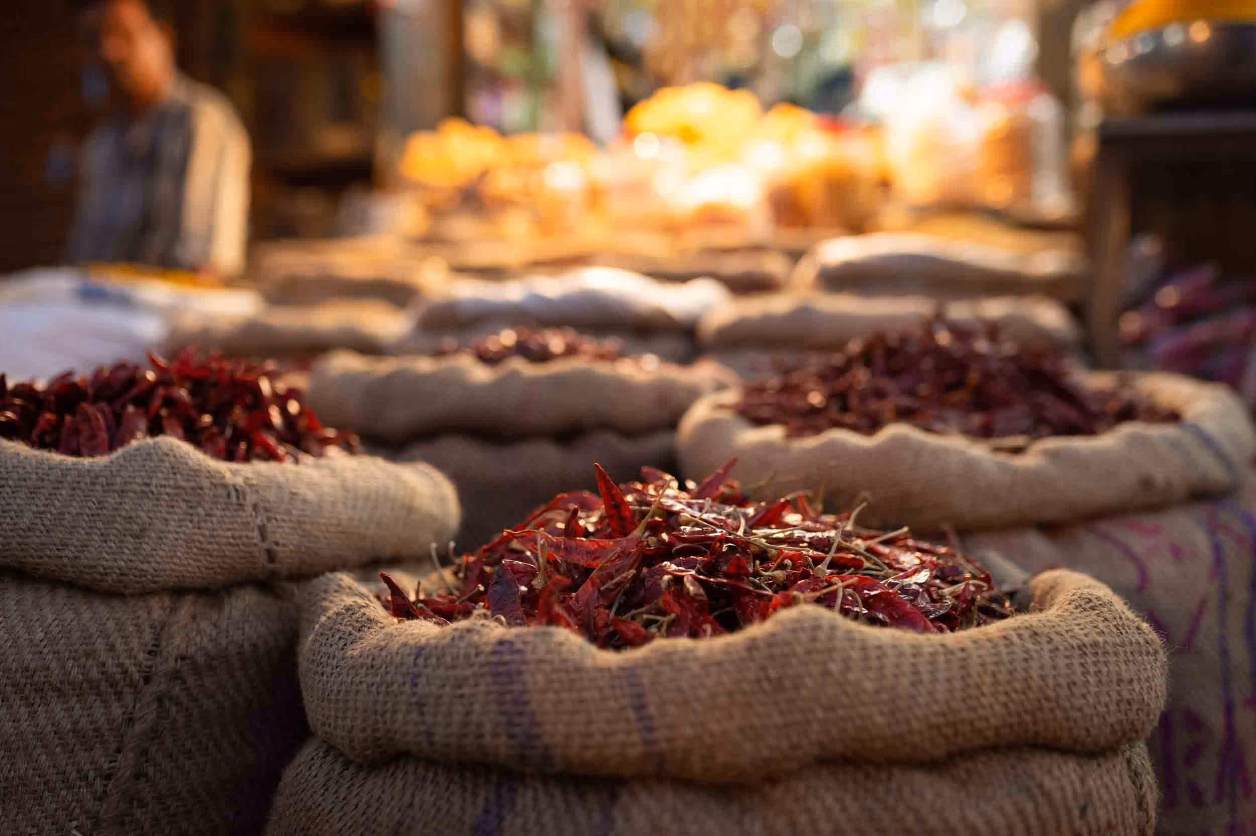 Many baskets of spices in India.