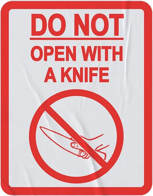 Red and white sticker reading Do Not Open With A Knife with a knife icon crossed out
