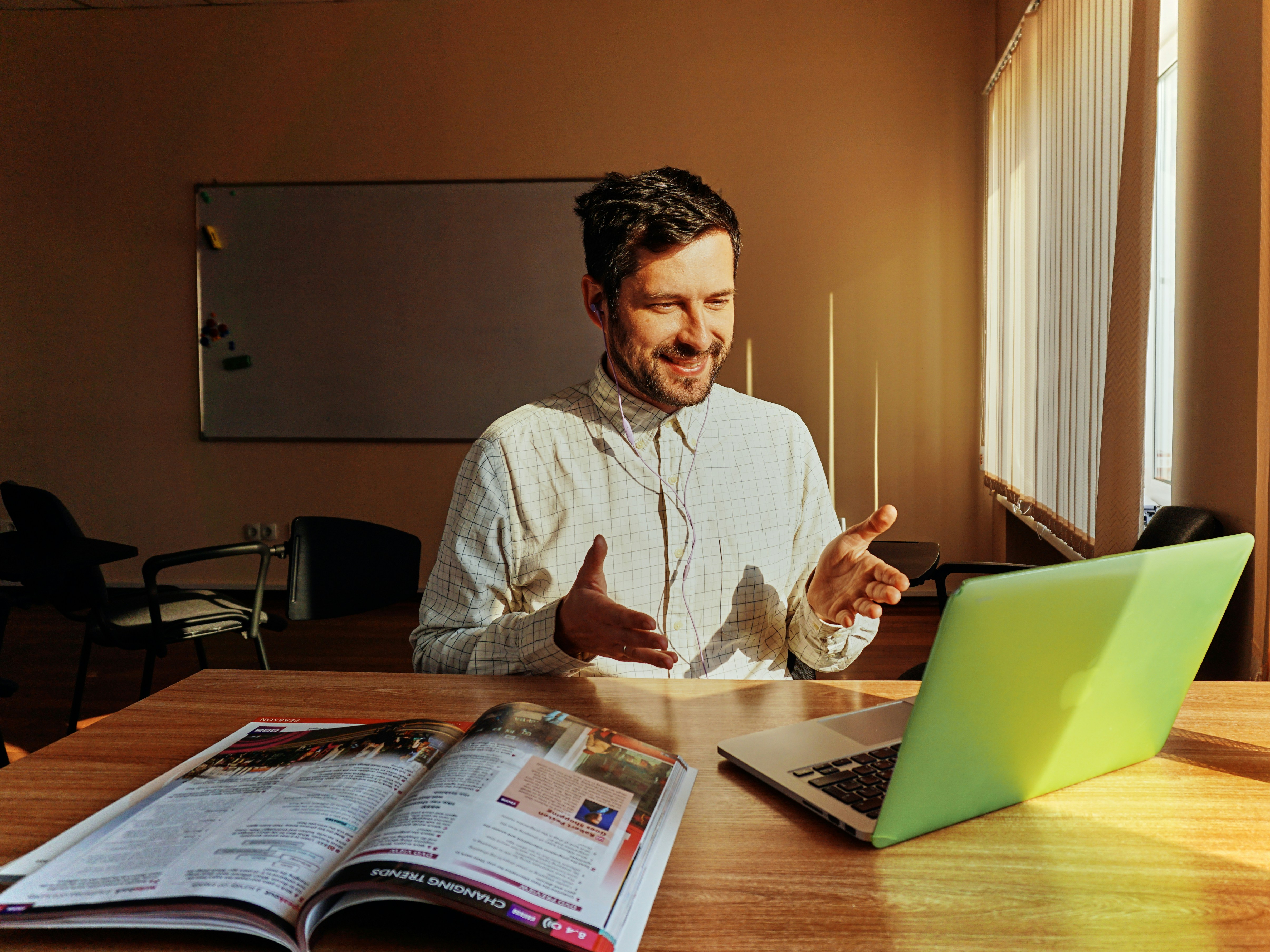 man working on laptop - Create Online Assessments