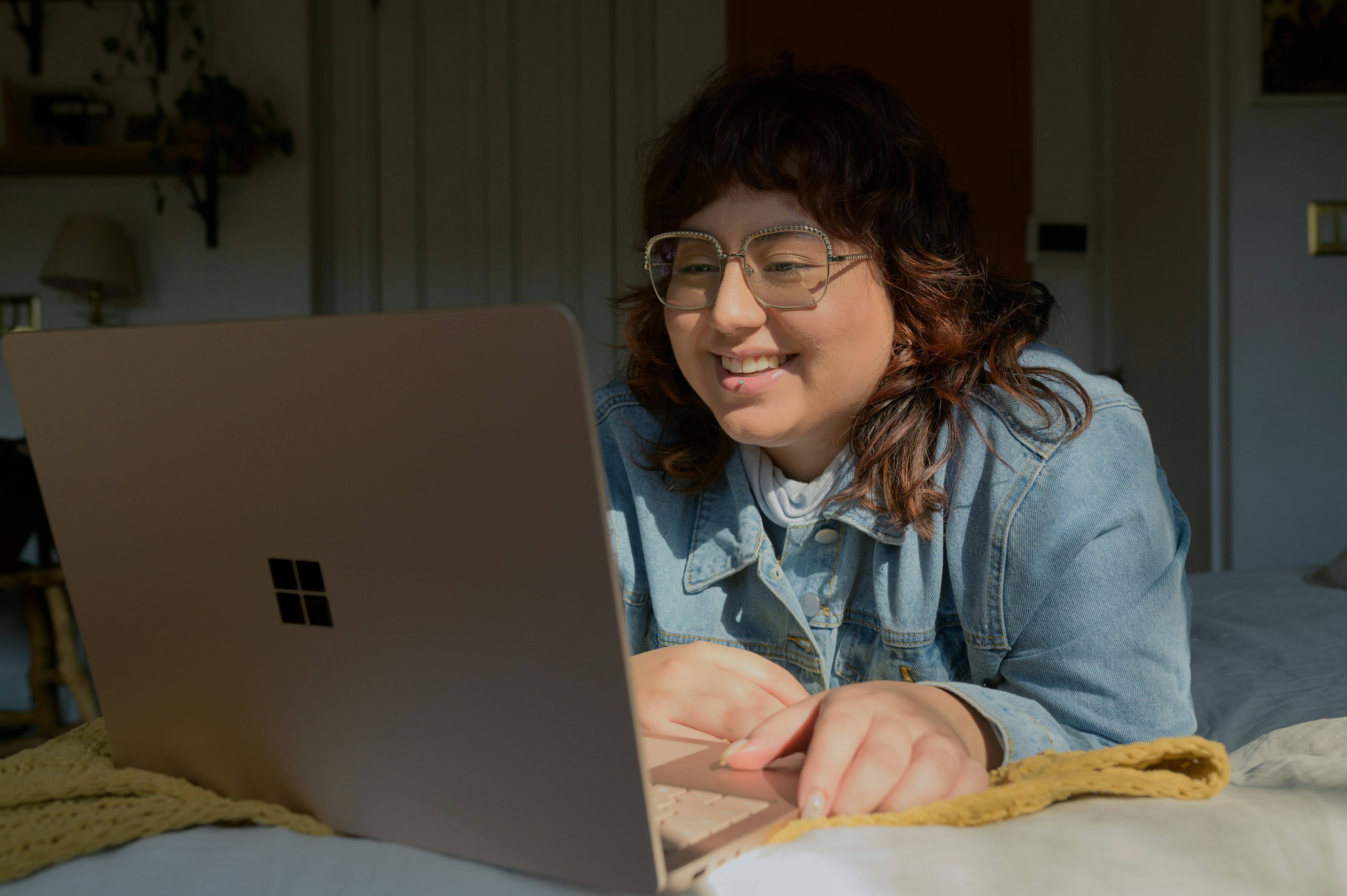 woman working on laptop - Create Online Assessments