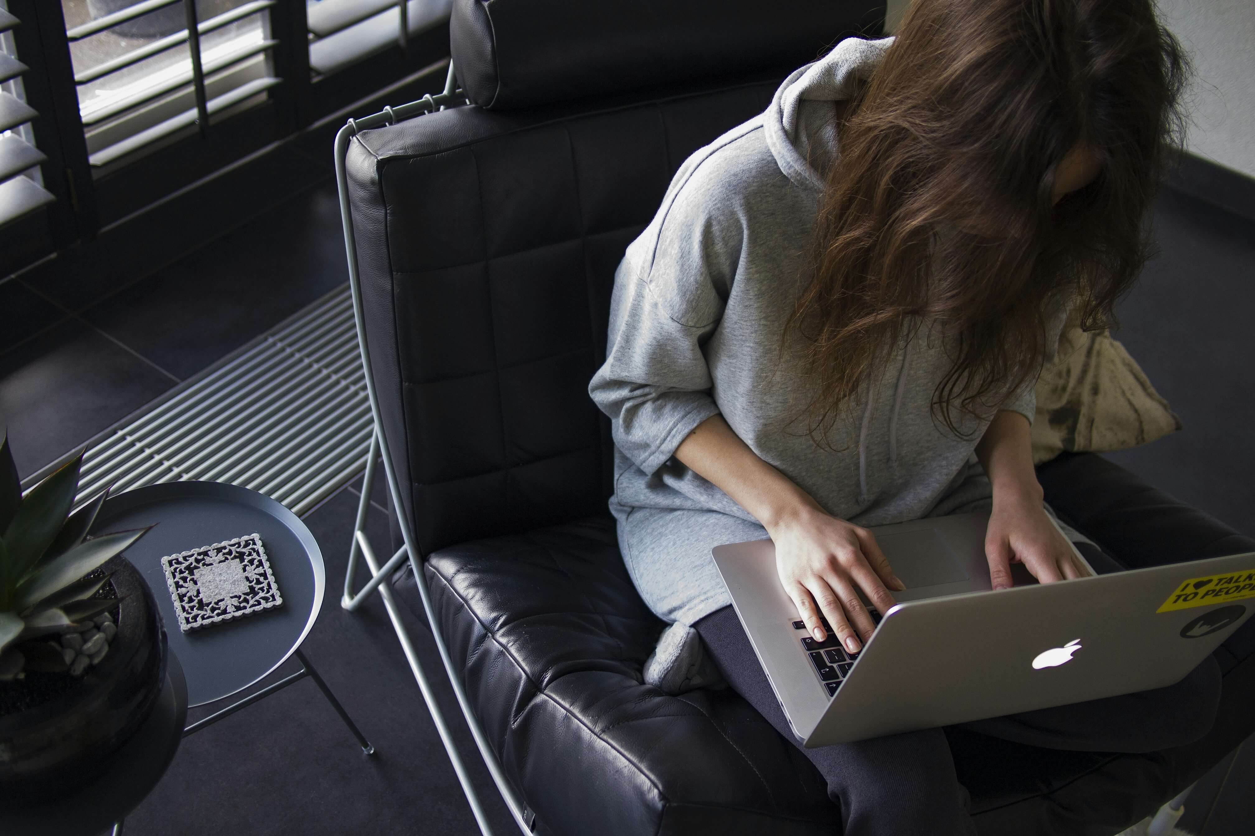 woman working on a laptop - Digital Assessment Tools