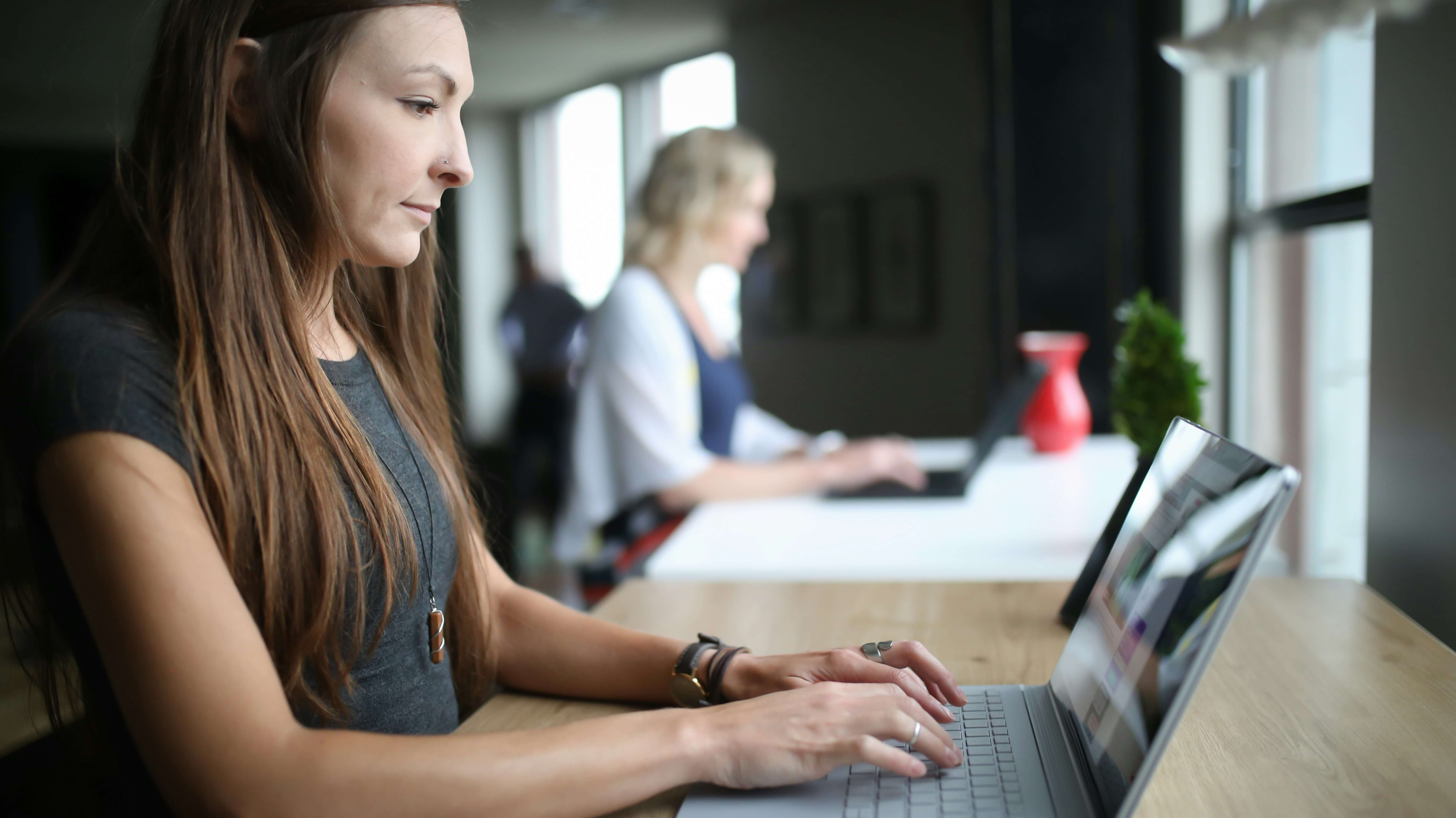 woman designing a Essay Grading Rubric