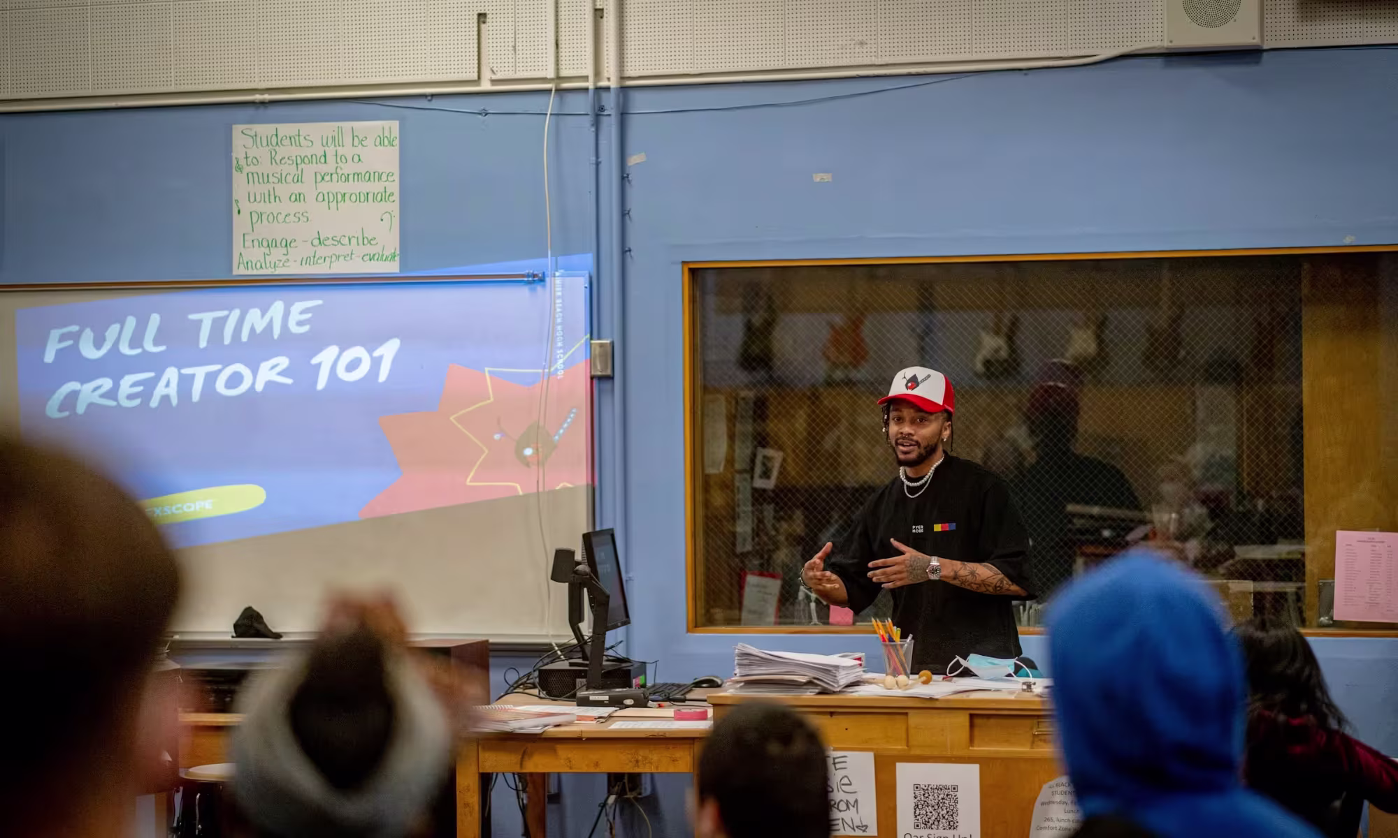 man teaching in a class - What Are Some Considerations Before Using AI in the Classroom?