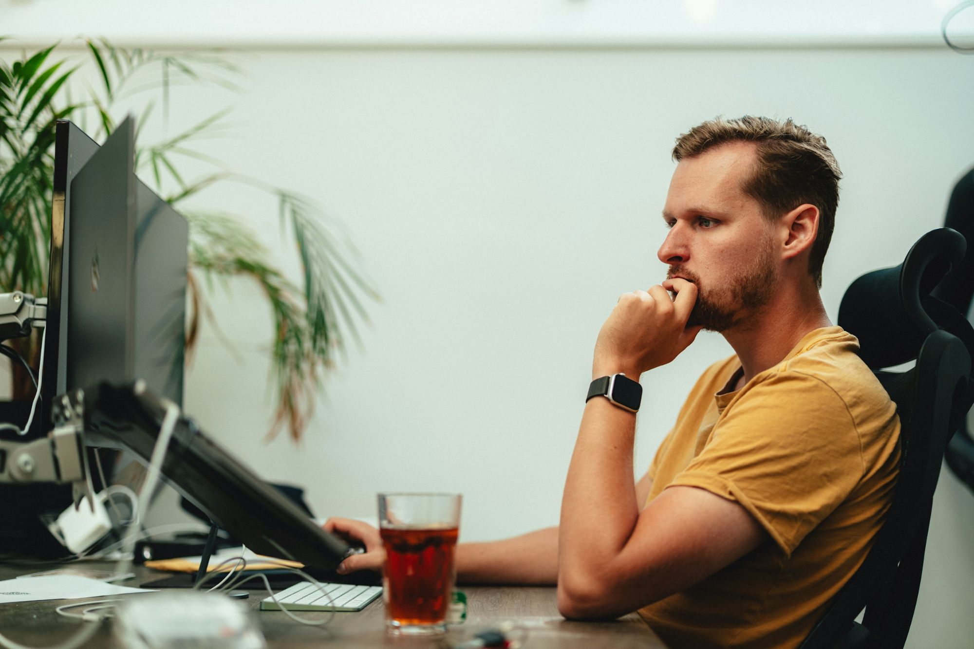 man on a laptop - How to Track Student Progress