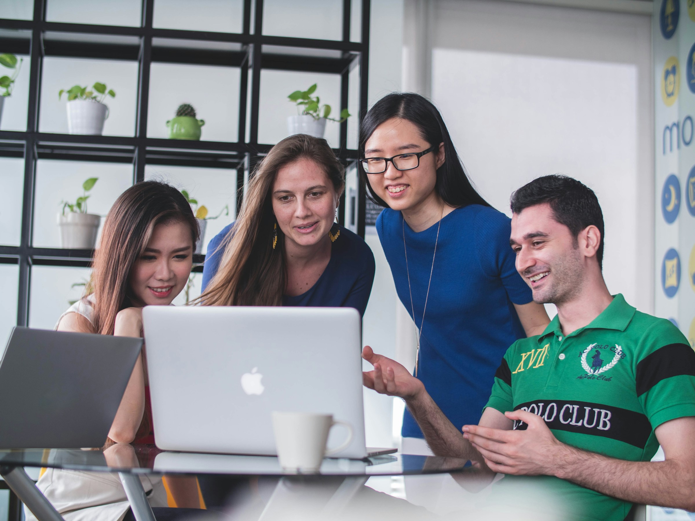 People Looking at a Laptop Screen - Electronic School Assessment Tools
