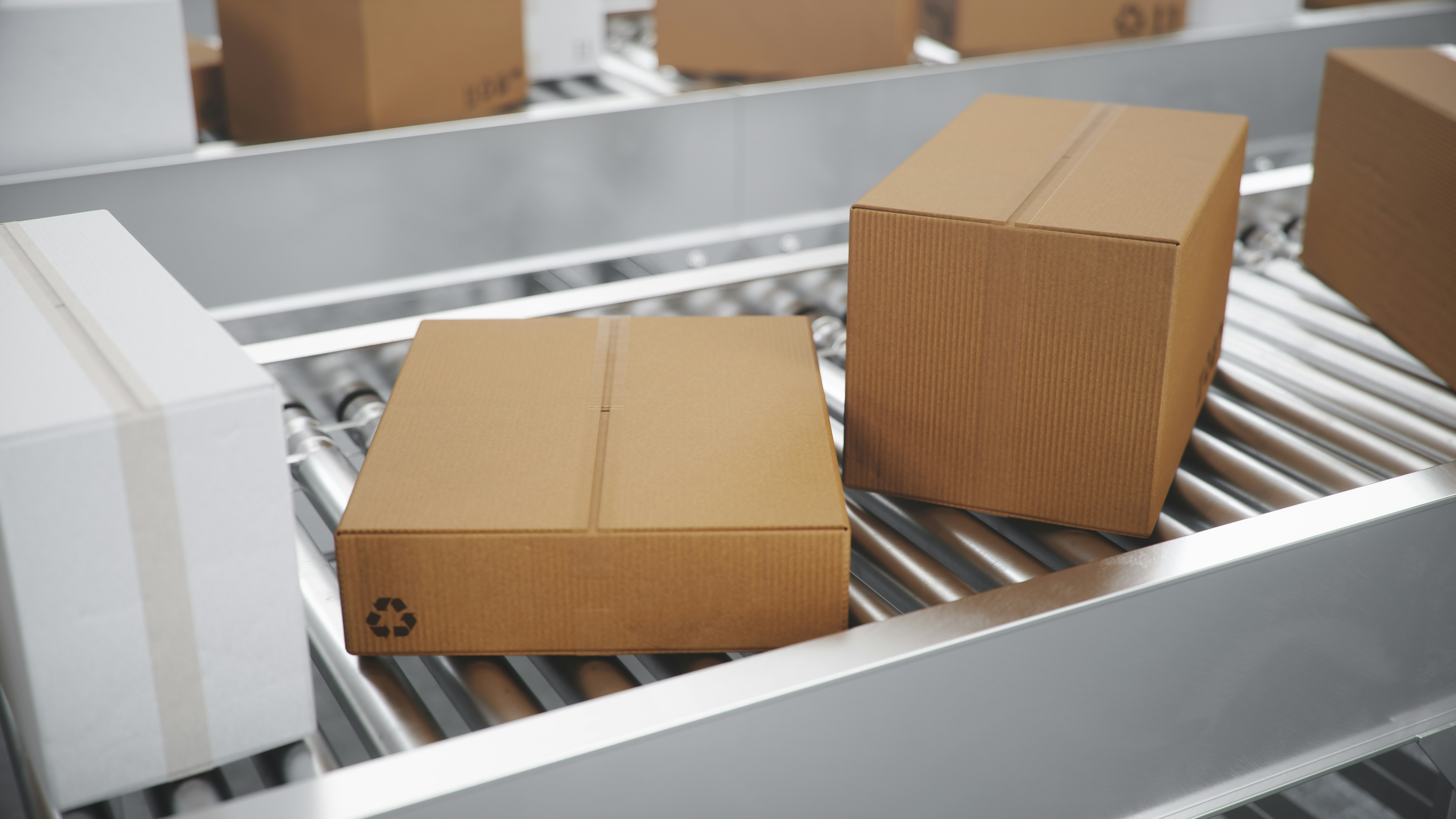Ecommerce fulfillment boxes ready for shipping in a warehouse.