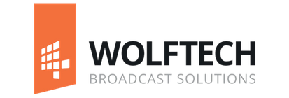 Logo with an orange tilted rectangular shape containing abstract black squares to the left of the text 'WOLFTECH BROADCAST SOLUTIONS', with 'WOLFTECH' in black uppercase and 'BROADCAST SOLUTIONS' in smaller gray uppercase letters below.