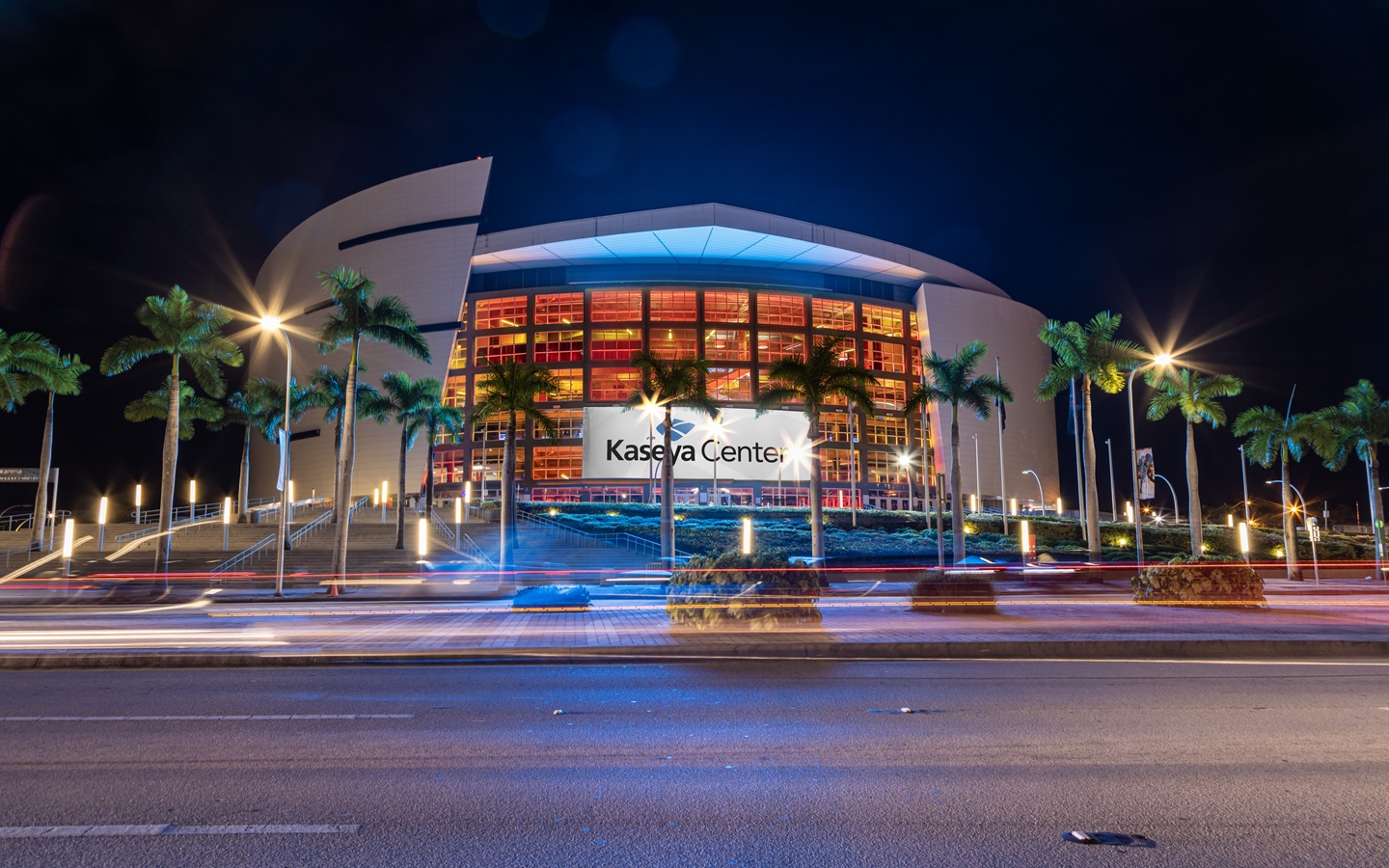 Night view of Kaseya Center in downtown Miami beautifully illuminated, captured during an evening ride with Car Service Miami Choice Limo
