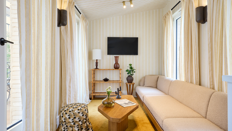 Living room of the duplex room of the Noucha Hotel Paris 16