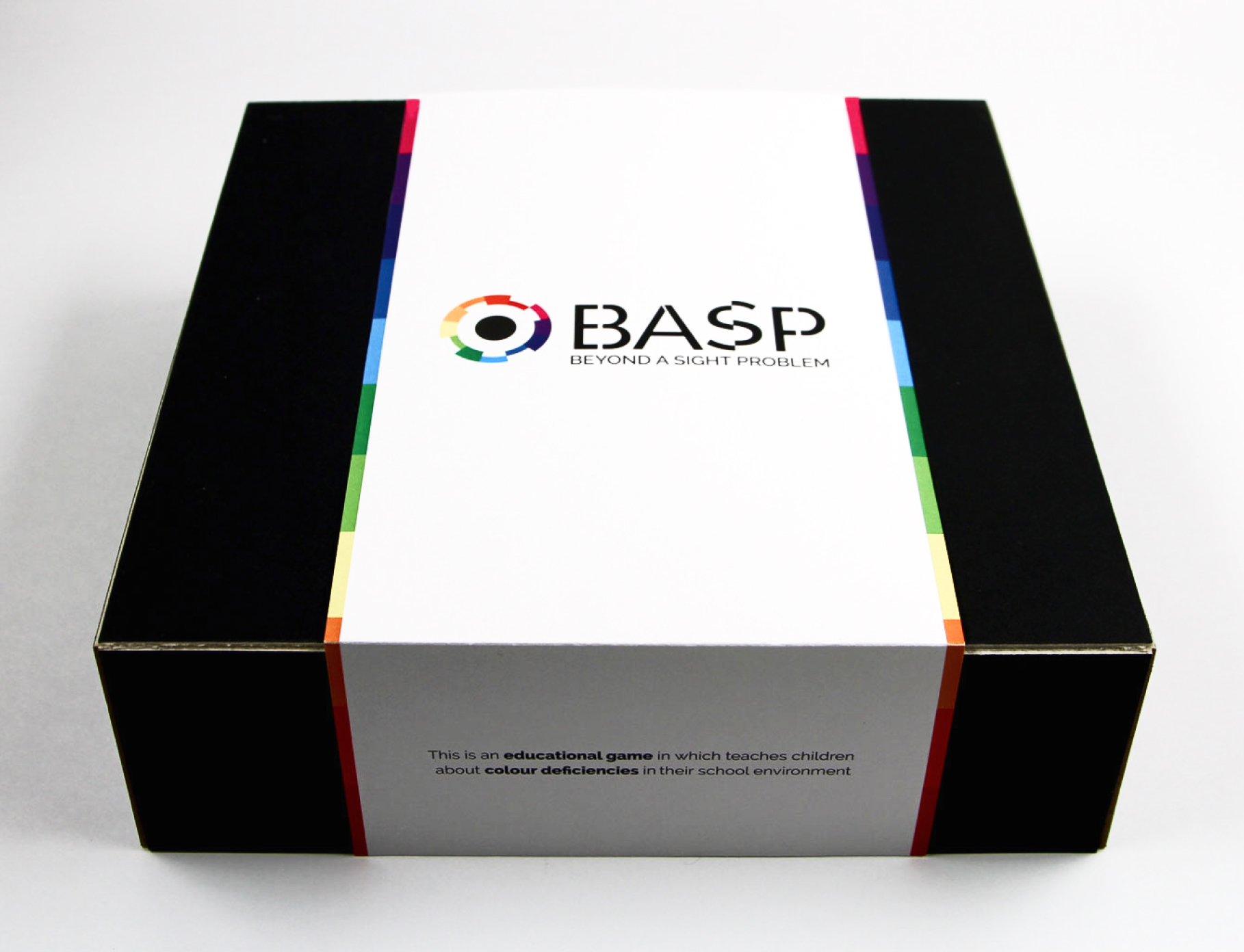 Board game packaging with coloured sides and the BASP logo displayed on the front.