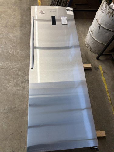 Stainless steel refrigerator with digital panel and handle.