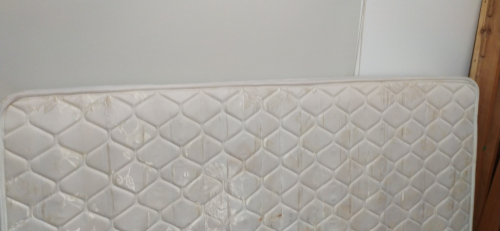 Mattress with a quilted pattern.