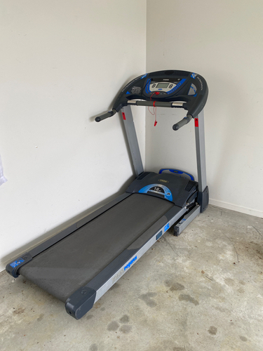 Treadmill with display and control panel.