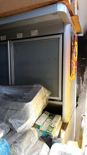 Fridge, aluminum trays, cartons.