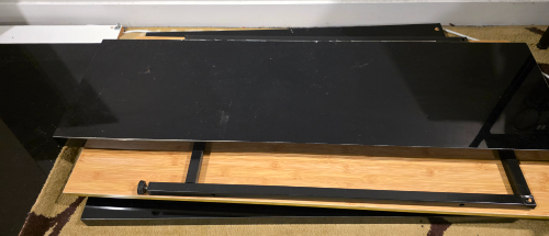 Black tabletop, wooden tabletop, metal frame.