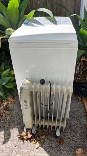 Washing machine and oil-filled radiator heater.