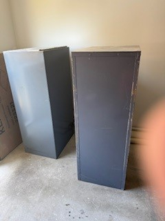 Two gray storage cabinets.