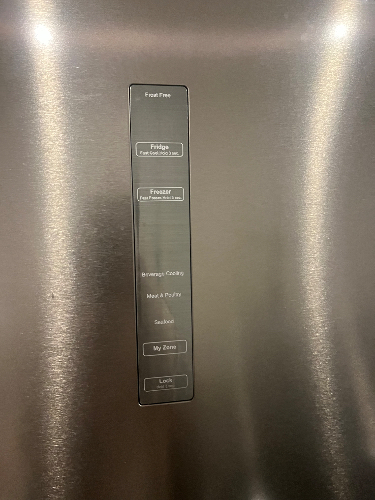 Stainless steel refrigerator control panel with buttons for Freezer, Fridge, Beverages, Meat & Poultry, Seafood, and My Zone.