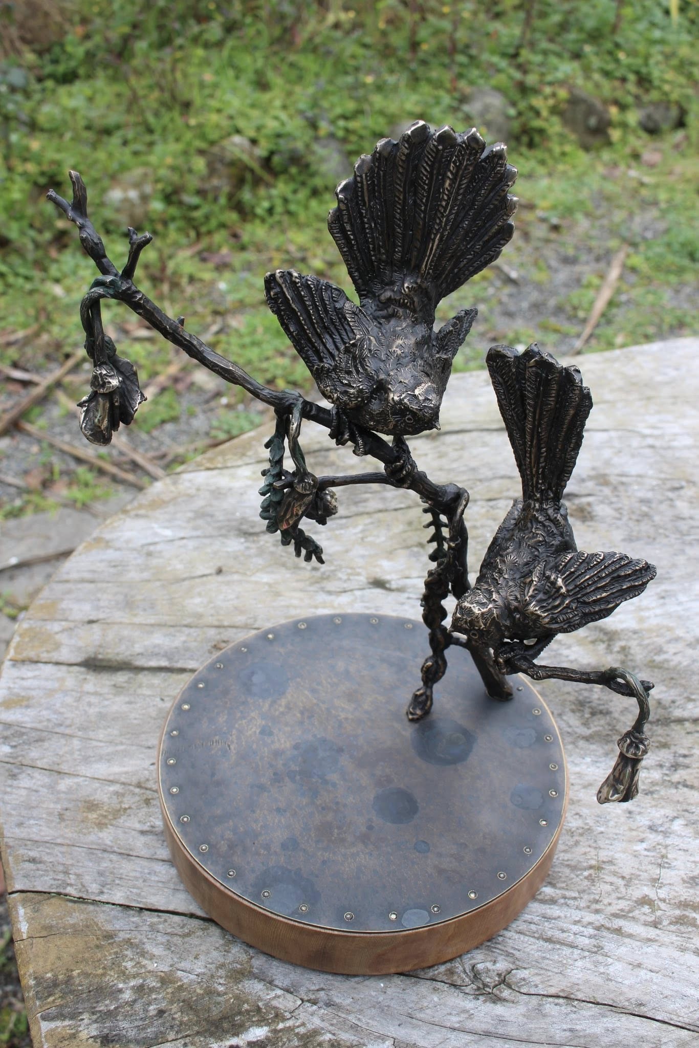 Matt Gauldie "Piwakawaka on Kowhai' bronze on brass & rimu 1/1  (300 x 360 x 220mm) 